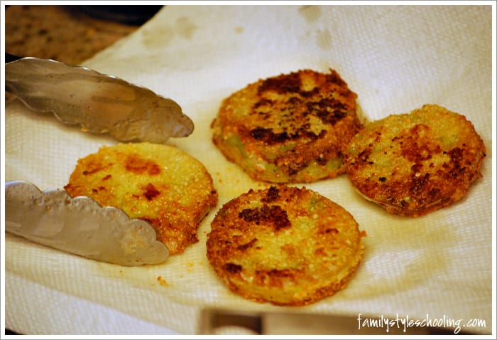 fried green tomatoes on paper towels